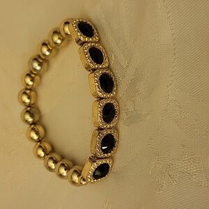 NWOT Gold Elastic Bracelet